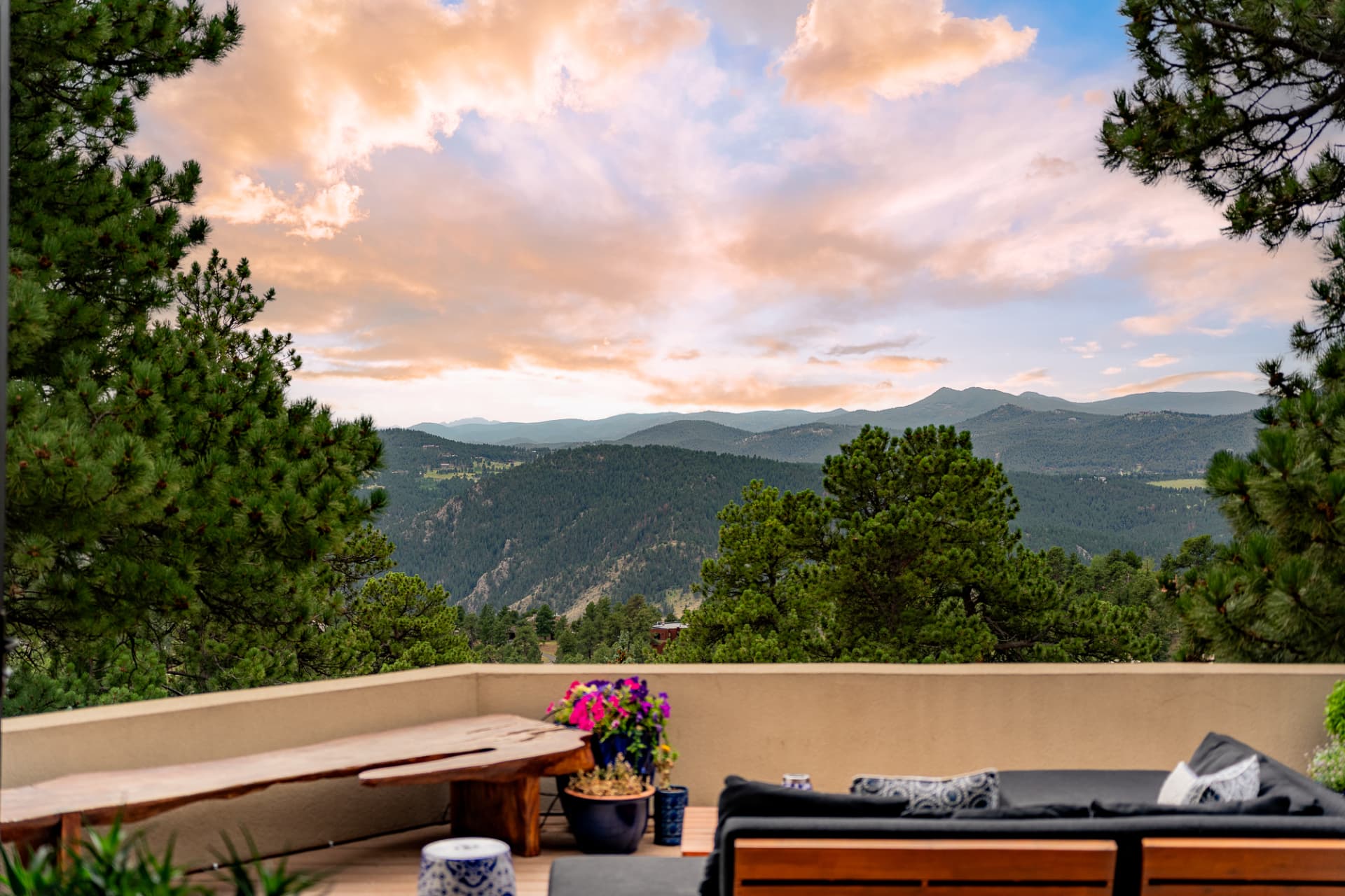 Layered mountain ranges at sunset from the deck