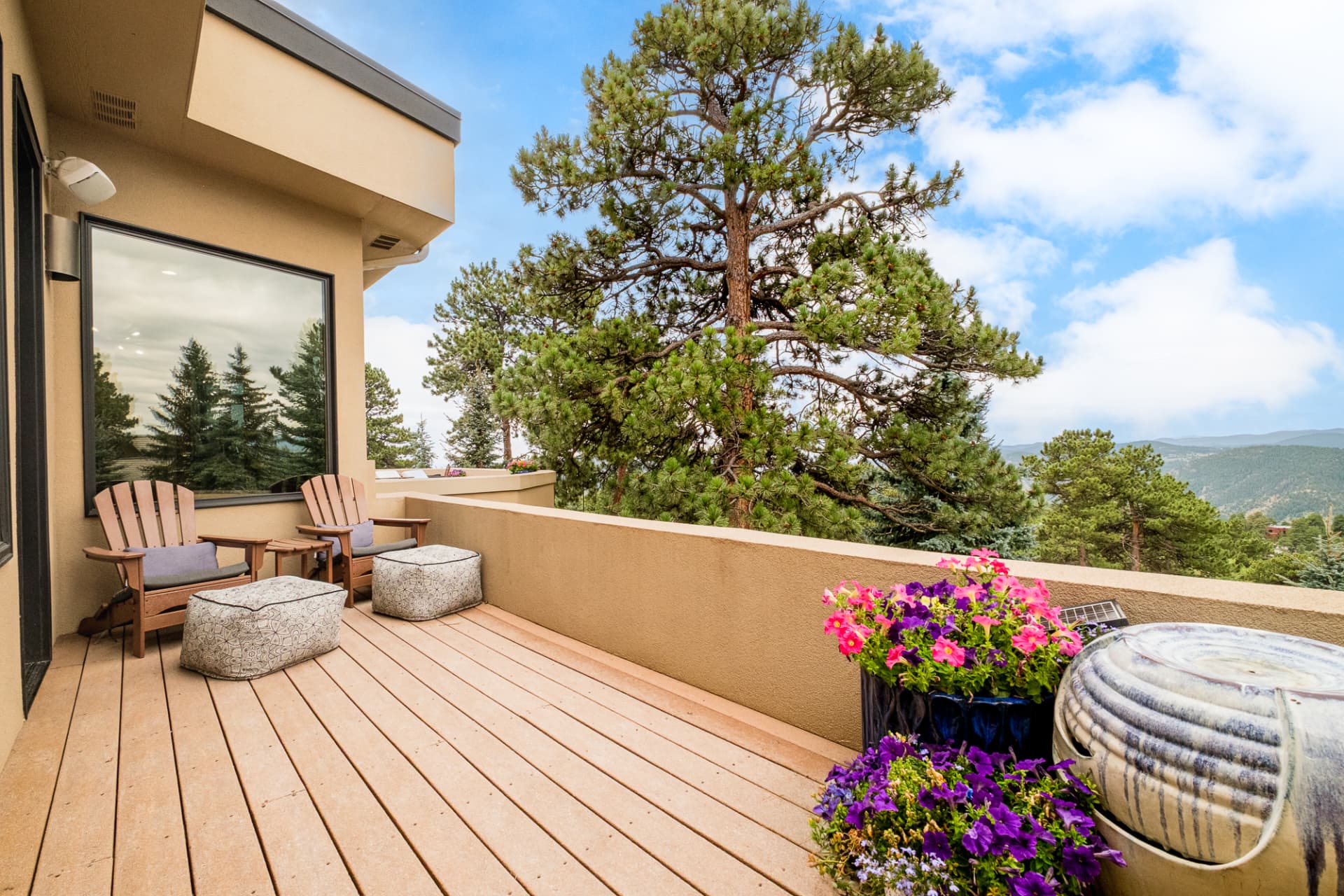 Private balcony with Adirondack chairs