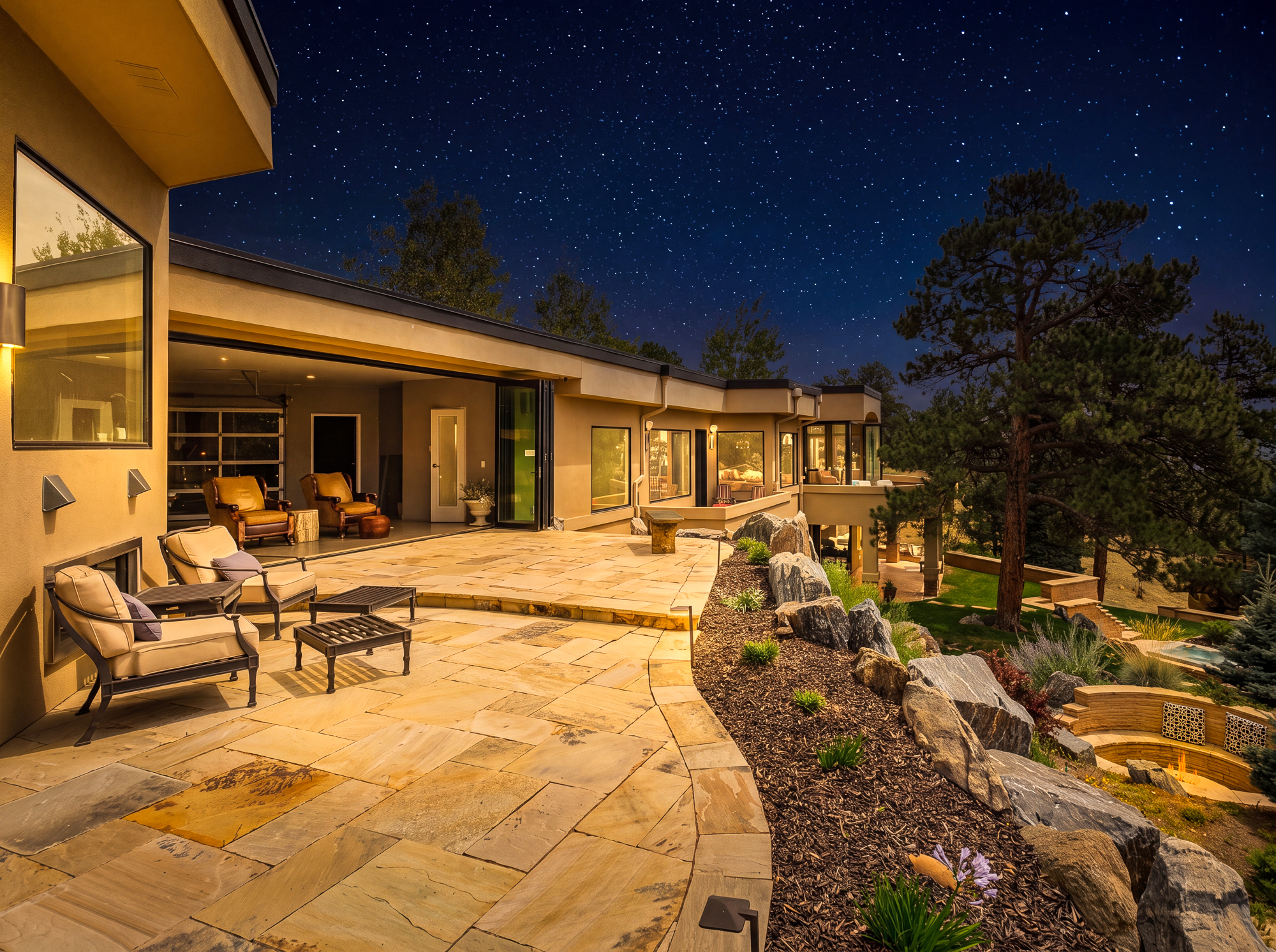 The patio beneath a starry mountain sky