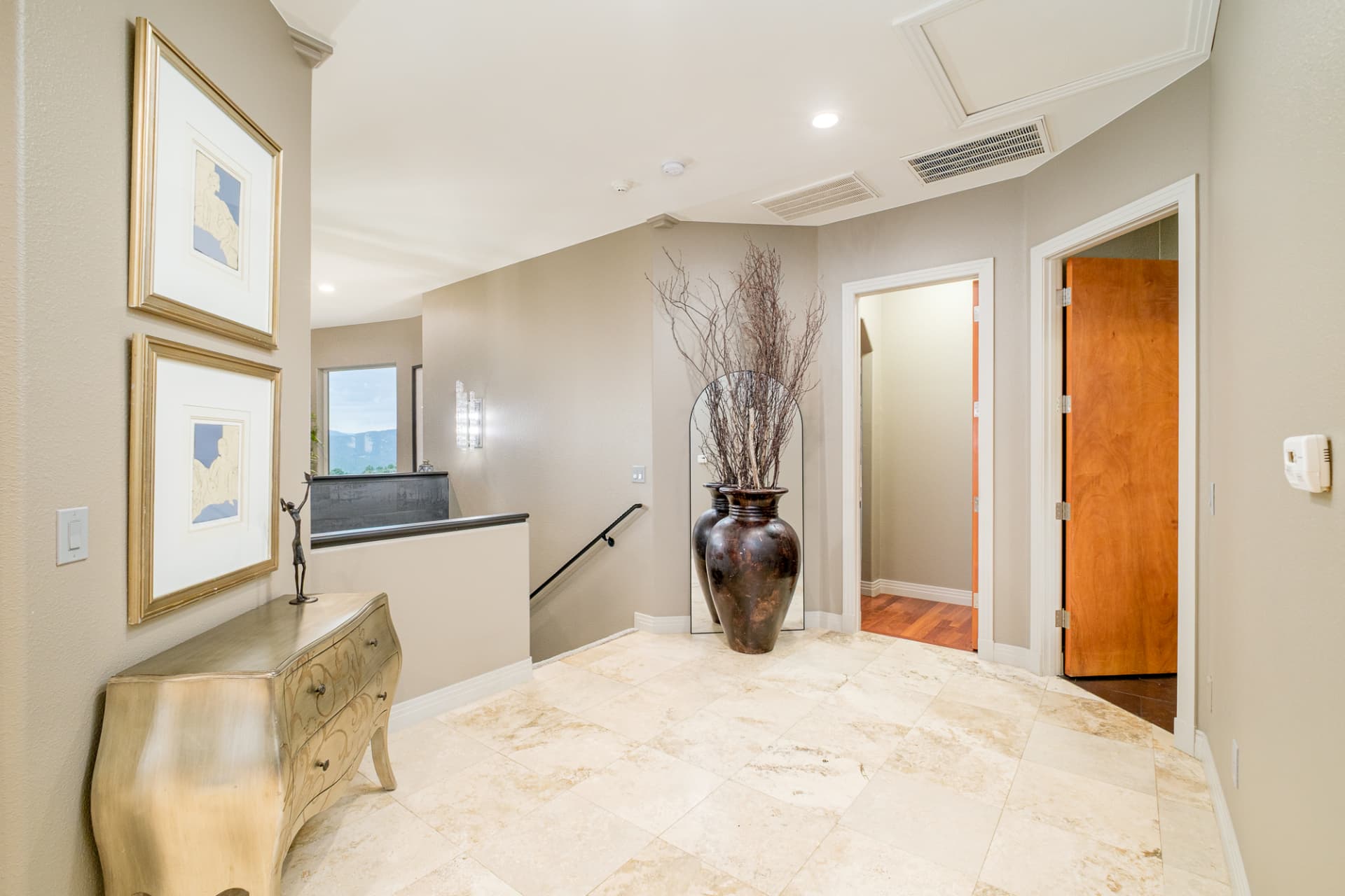 Tiled hallway and stair landing