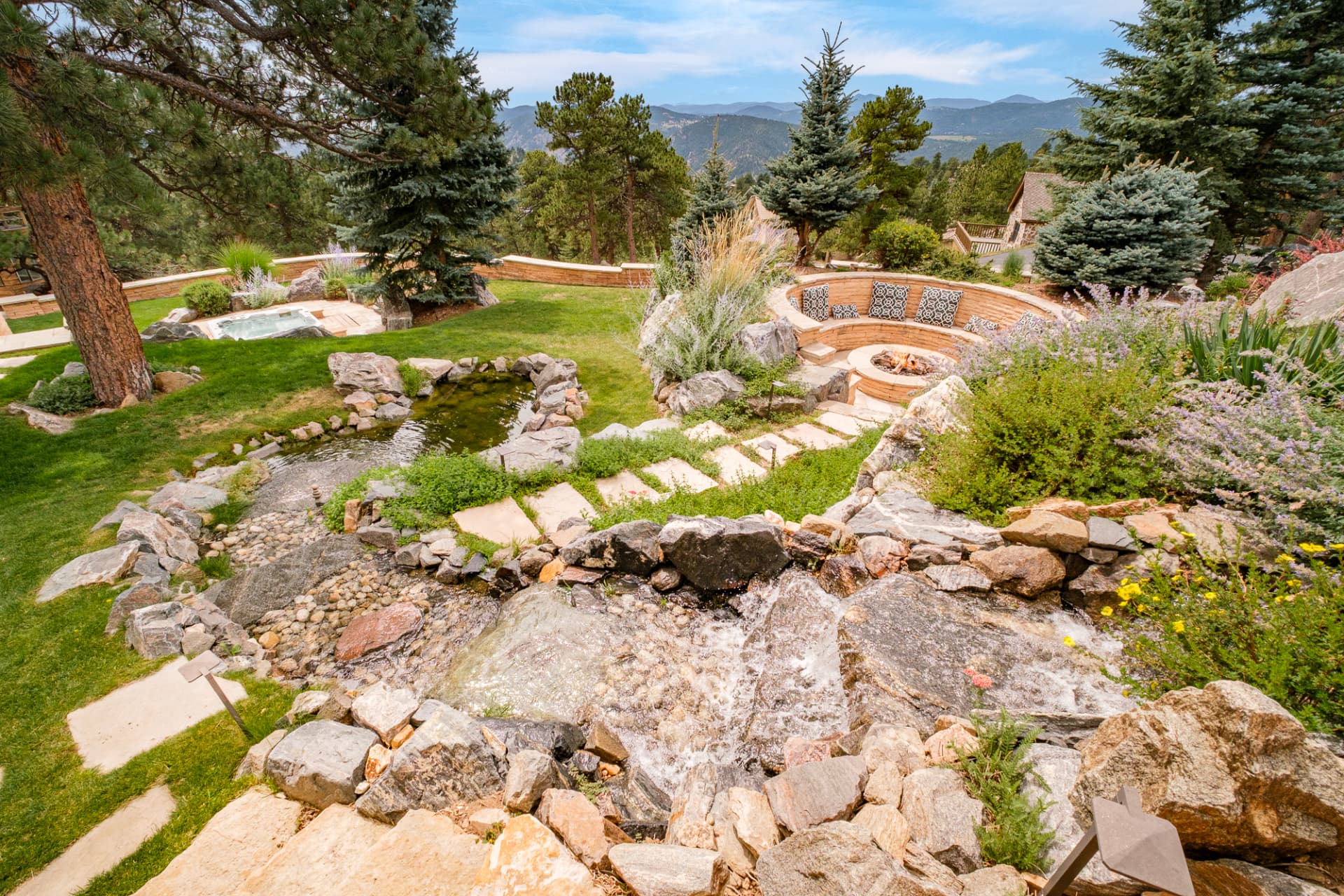 Aerial view of the waterfall, fire pit and grounds