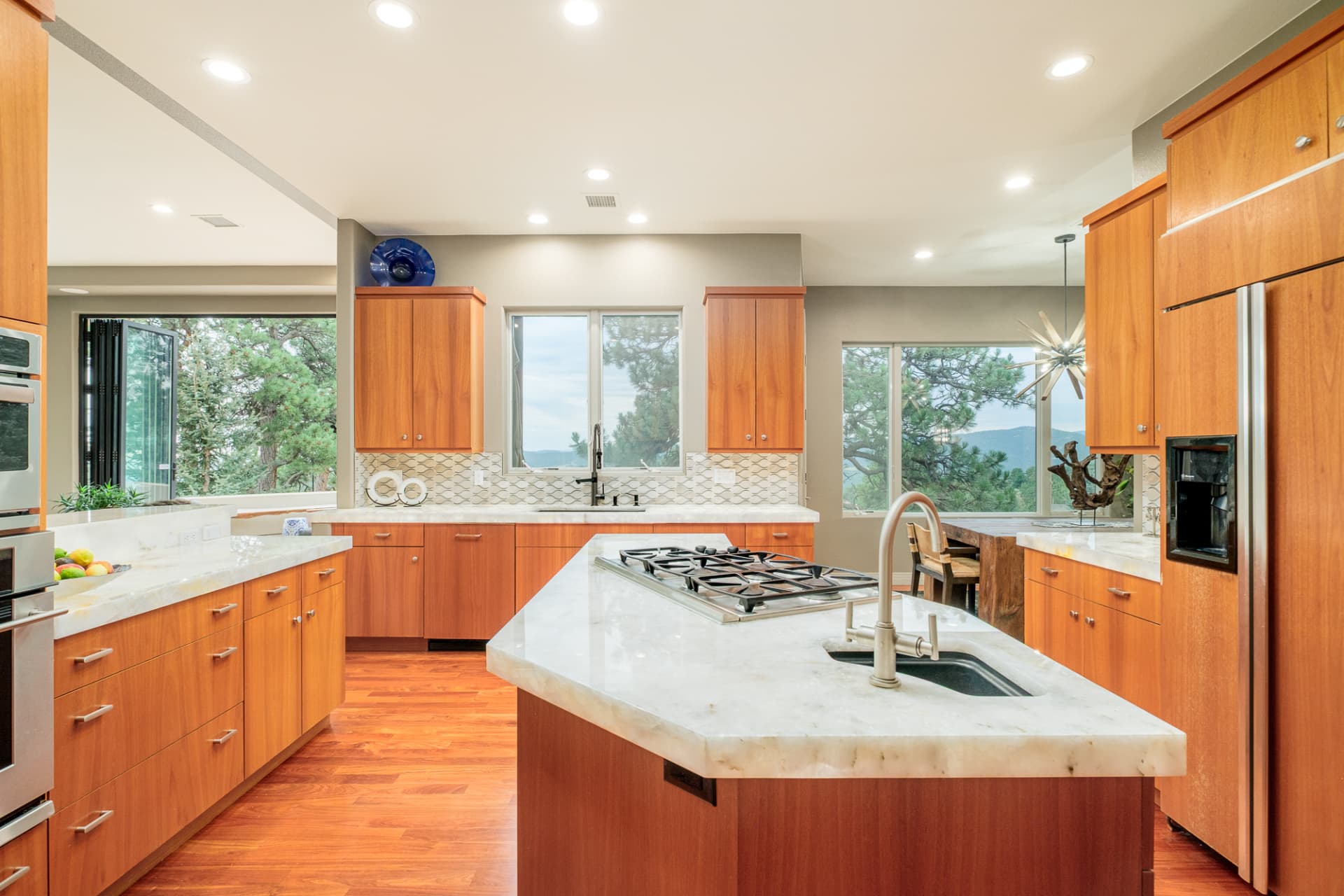 Island cooktop with mountain views beyond